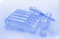 Blue ampules and syringe Royalty Free Stock Photo