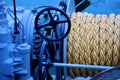 Blue anchor winch with yellow rope Royalty Free Stock Photo