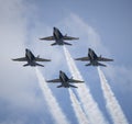 The Blue Angels flying in diamond formation