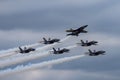 Blue Angels formation planes flying over Houston against a cloudy sky, United States Royalty Free Stock Photo