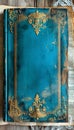 A blue antique book with gold trim. Vintage background space for text