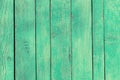 Blue Aquamarine old wooden fence. wood palisade background. planks texture, weathered surface Royalty Free Stock Photo