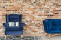 Blue armchair and pattern rug