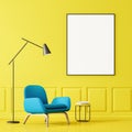 Blue armchair and poster in yellow living room Royalty Free Stock Photo