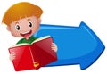 Blue arrow with boy reading book Royalty Free Stock Photo