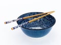 Blue asian porcelain bowl with chopsticks. Royalty Free Stock Photo