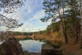 Blue autumn sky with clouds reflected in the pond Royalty Free Stock Photo