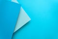 Blue and azure pastel color papered background. Volume geometric flat lay. Top view. Copy space Royalty Free Stock Photo