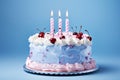 Blue baby boy birthday cake with three candles cream and cherry Royalty Free Stock Photo