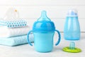 Blue baby cup - baby stuff Royalty Free Stock Photo