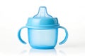 Blue baby cup - baby stuff Royalty Free Stock Photo