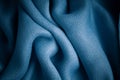 Blue background abstract cloth wavy folds of textile texture Royalty Free Stock Photo