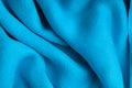 Blue background abstract cloth wavy folds of textile texture Royalty Free Stock Photo