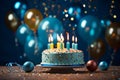 Blue background, birthday cake with candles, balloons, and confetti Royalty Free Stock Photo