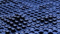 Blue background of black graphite cubes. 3D rendering illustration
