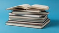 A blue background. The books vary in color mostly with neutral toned Royalty Free Stock Photo
