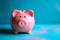 Blue background contrast Pink piggy bank, simple and vibrant