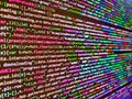 Blue background. Developer working on program codes in office. Javascript code. Source PC website developer. Coding, programming, Royalty Free Stock Photo