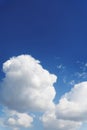 Blue background and huge clouds fluttering in the sky