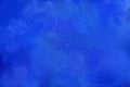 Blue background, intermingling shades of blue, reminiscent of water or smoke.