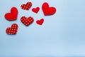 Blue background with red hearts, love concept