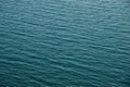 blue background of the water surface, ripples on the water, small waves Royalty Free Stock Photo