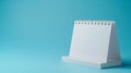 Blue background with white desk calendar flipping page Royalty Free Stock Photo