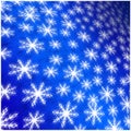 Blue background of white winter snowflakes for christmas and new