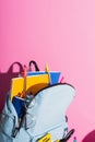 Blue backpack with notebooks, school supplies Royalty Free Stock Photo