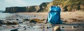 A blue backpack is sitting on the beach next to some rocks generated by AI Royalty Free Stock Photo