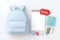 Blue backpack and stationery with sale tag on white background Royalty Free Stock Photo