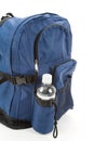 Blue backpack and water Royalty Free Stock Photo
