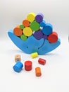 Blue balance toy with colored cilinders Royalty Free Stock Photo