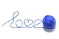 Blue ball of thread and the word love on a white background Royalty Free Stock Photo