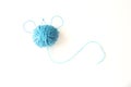 Blue ball of woolen thread on a light background Royalty Free Stock Photo