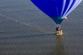 Blue balloon over water Royalty Free Stock Photo