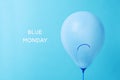 Blue balloon with a sad face and text blue monday Royalty Free Stock Photo