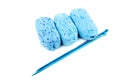 Blue balls of a yarn knitting spokes Royalty Free Stock Photo