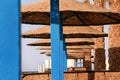 Blue bamboo parasol on the beach Egypt