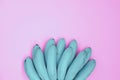 Blue bananas bunch top view on pink background