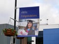 Blue banner showing a student and congratulations inspiring tomorrows professionals