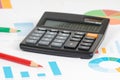 Blue bar charts with calculator and pencils 2 Royalty Free Stock Photo