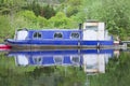 Blue barge boat on canal river Royalty Free Stock Photo