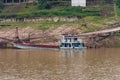 Blue barge at slipway on Yangtze River, China