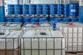 Blue barrels in the warehouse on pallets Royalty Free Stock Photo