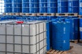 Blue barrels in the warehouse on pallets