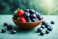 blue barries and strawberies in the bowl