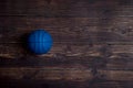 Blue Basketball On old Hardwood Court Floor With Spot Lighting