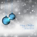 Blue bauble and snowflakes on a christmas winter background