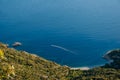 Blue bay and boat under Lubenice town in Cres Royalty Free Stock Photo